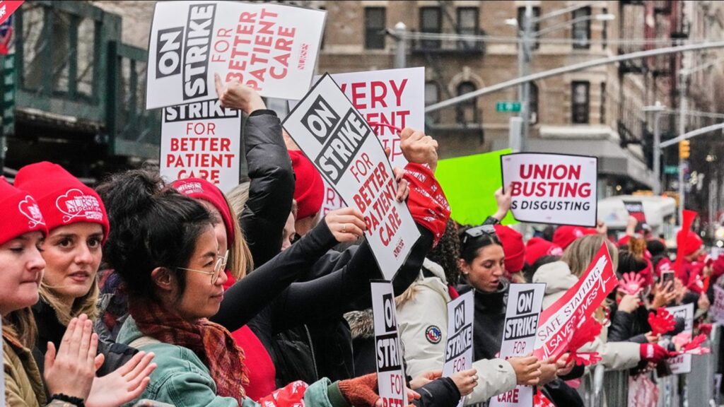 Nurses rally against the financial elite in new york strike