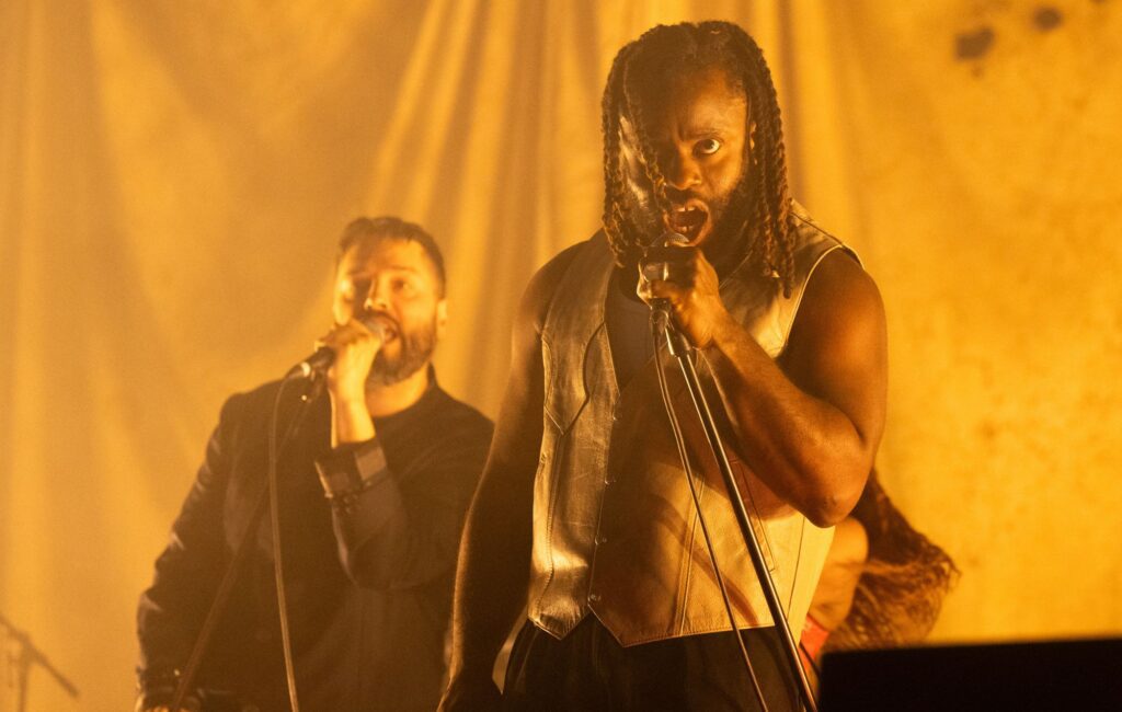 Young fathers support immigration and war child with super bowl